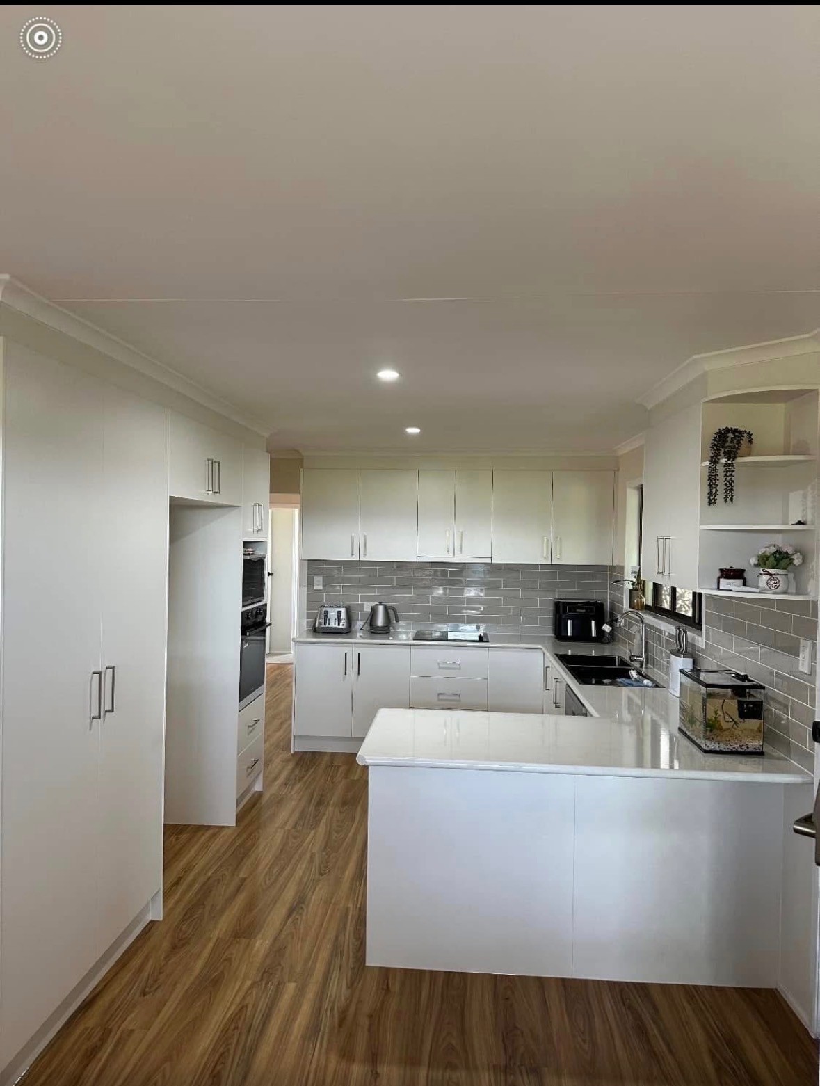 White Shaker kitchen with grey subway splashback — PMG Cabinetry